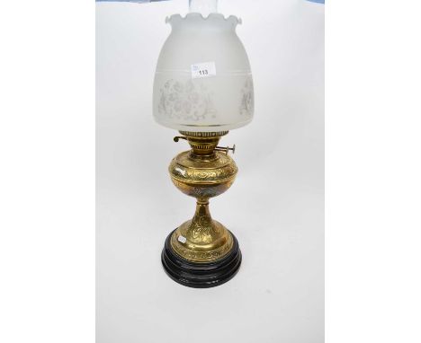 Brass oil lamp with shade of floral design