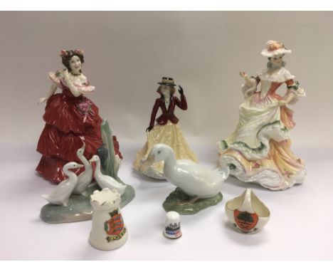 A small collection of ceramics comprising Royal Doulton figures of ladies, Nao geese, crested ware etc.