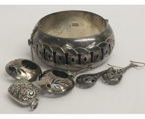 Mexican Jewellery including a bangle, two pairs of earrings, pierced design pendant and one other
