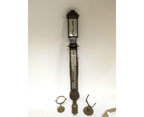 A Quality 19th century Ships Barometer with brass balance weight and ships gimbals with a rosewood case and engraved bone dia