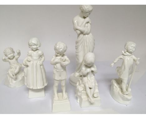 A white glazed Royal Worcester figure in the form of a young boy holding a cat and other similar white glazed figures. No dam
