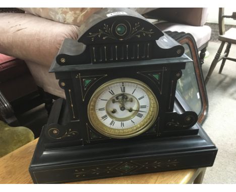 A Quality large Victorian black slate and marble mantel clock with an enamel dial and visible mechanism the French movement s