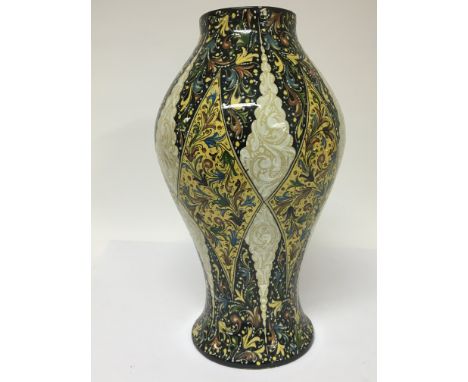 A decorative Italian ceramic vase by Molaroni Pesaro signed base Hight 31cm no damage or restoration.