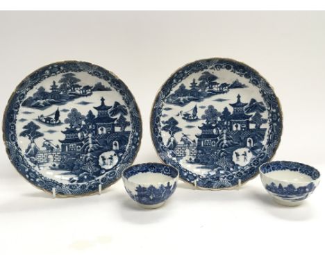 Four items of 18th century Worcester blue and white transfer ware consisting of two plates and two tea bowls