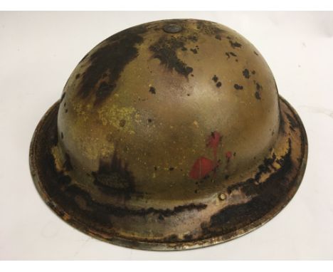 A WW2 British Brodie helmet with insignia of British troops in Egypt. Maker Joesph Shank &amp; Sons dated 1939