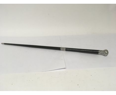 A silver mounted ebony Early 20th century swagger stick London hallmarks.