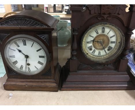 Two mantal clocks with Roman numerals.and a brass barometer.