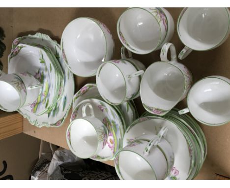 A Royal Parogon fine bone China tea set the WaterLily pattern eleven cups saucers plates side plates no obvious damage.