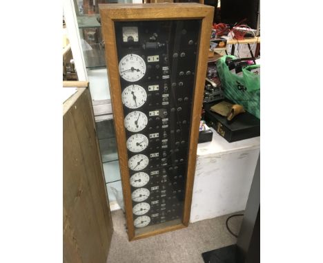 A rare early 20 th Century multi dial master synchronome clock.