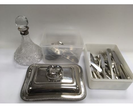 A silver plated entree dish, a silver collared ship's decanter and silver plated cutlery.