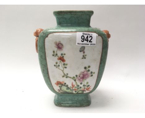 A Chinese porcelain vase with Famille rose decoration, 21cm.