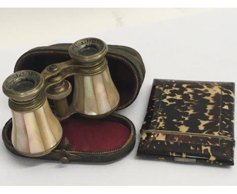 A tortoiseshell card case and a Pair of cased mother of Pearl Opera glasses