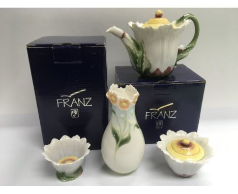 A Franz tea service and vases.