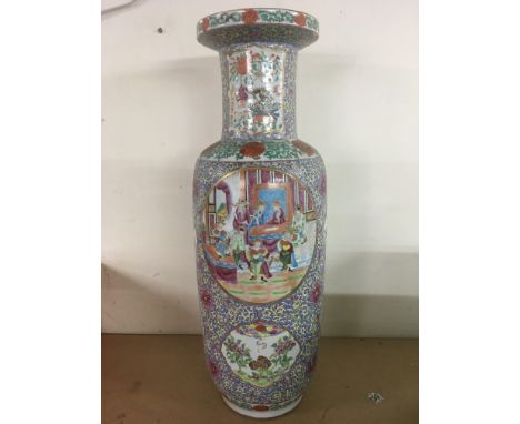 A large Cantonese enamel porcelain vase with court scenes decoration. 64cm.