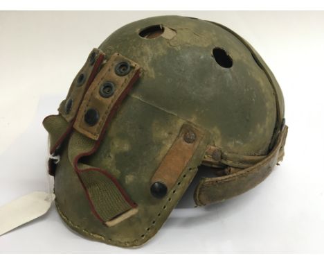 A WW2 "Rawlings" US Tank crew helmet. Size 7, with insignia of a tank destroyer Battalion