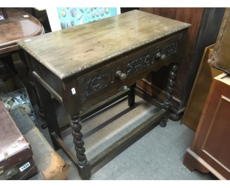 An oak cupboard and an oak side table (2).