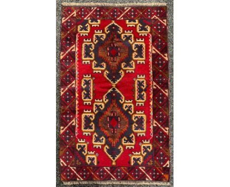 Oriental Rugs and Carpets - a Baluchi carpet, 138cm x 85cm