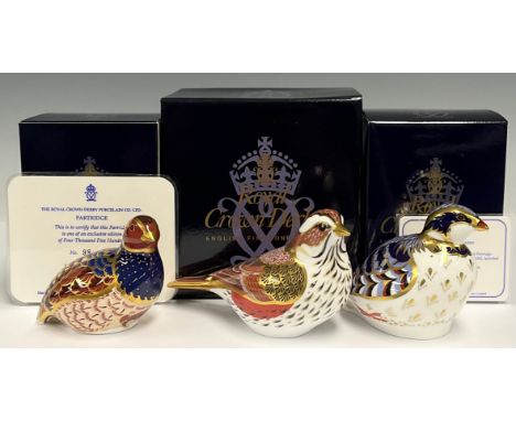 A Royal Crown Derby paperweight, Redwing, Collectors Guild exclusive, gold stopper, boxed; others, Partridge, limited edition