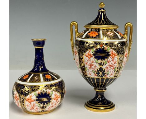 An 1128 imari twin handled urn and cover, 14.5cm high;  similar baluster vase 9.3cm high (2)