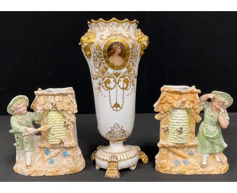 A later 19th century Bohemian Bud Vase Ivory ground with gilt painted floral and foliate scroll enamels, central portrait vig