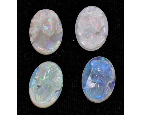 OPAL; four oval cabochon cut stones each carved with the profile detail of a woman, weighing 10.57ct, 14mm x 10mm (4).