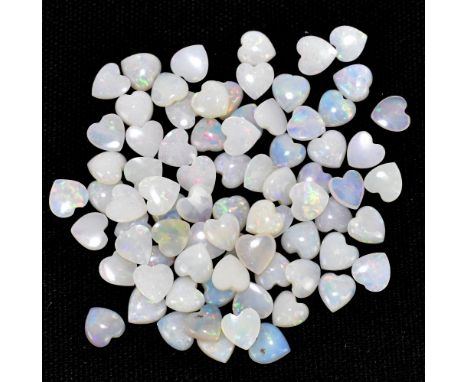 OPAL; a group of heart-shaped cabochon cut stones weighing 20ct, each 5mm.