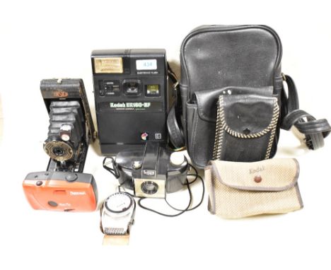 A selection of cameras including Kodak EK160-EF instant camera, Ensign folding camera, Kodak Brownie 127, light meter etc