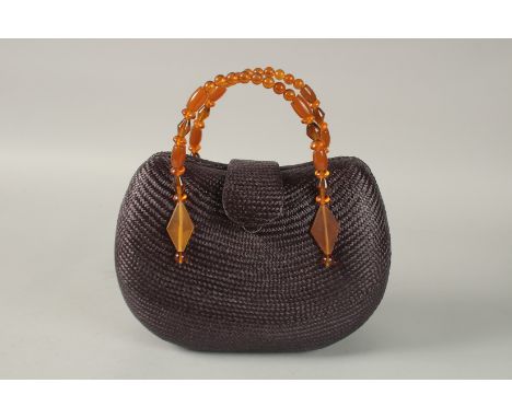 L. K. BENNETT, A BLUE HESSIAN BAG with AMBER HANDLES. 25cms wide.