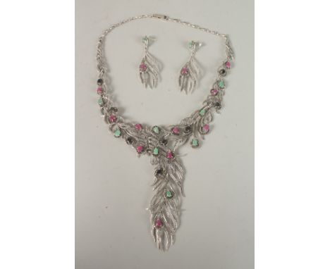 A SILVER SAPPHIRE, RUBY AND EMERALD NECKLACE, EARRINGS AND RING.