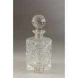 TWO GLASS DECANTERS AND STOPPERS.