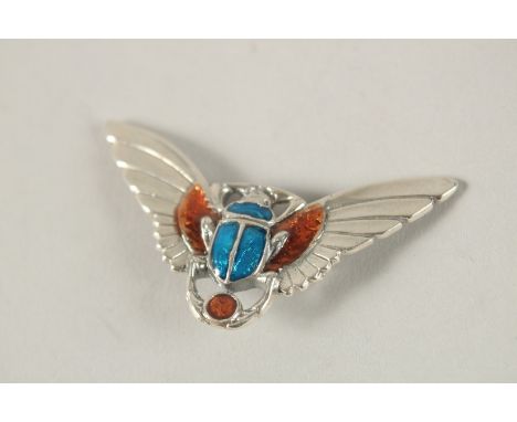 A SILVER AND ENAMEL BAT BROOCH.