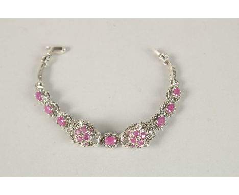 A SILVER RUBY AND MARCASITE PANTHER BRACELET.