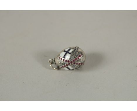 A SILVER AND ENAMEL ANCHOR AND FLAG PENDANT.