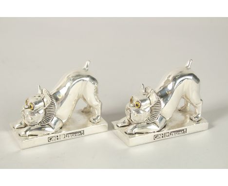 A PAIR OF ART DECO PUG DOG SALT AND PEPPERS. 8cms high.