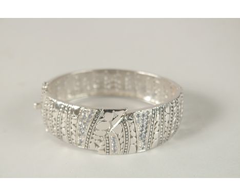 A GOOD SILVER BANGLE. 7cms x 5.5cms in a boxed Goldsmith's leather case. 42grms.