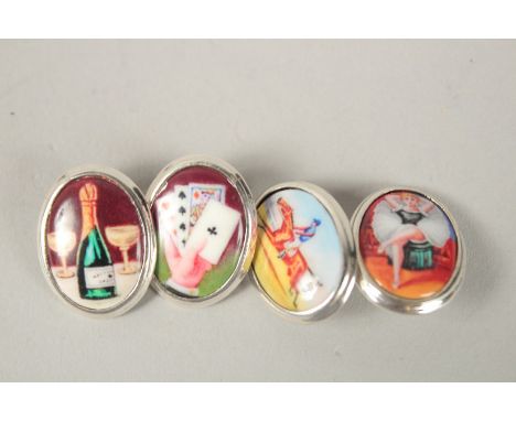A PAIR OF SILVER AND ENAMEL FOUR VICES CUFFLINKS.