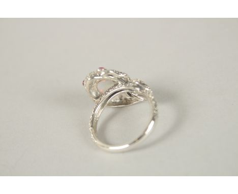 A SILVER OPAL SNAKE RING. Ring size (R).