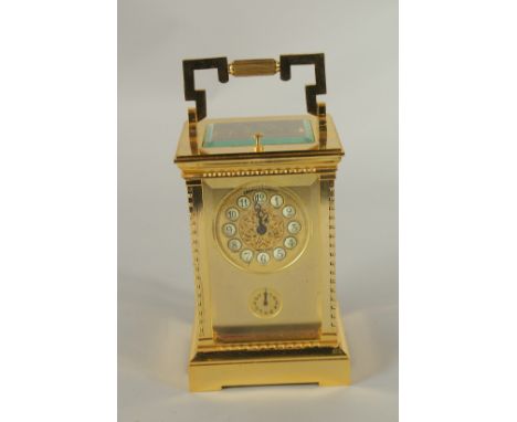 A VERY GOOD FRENCH GILDED REPEATER CARRIAGE CLOCK. Cameron &amp; Foster, New York. 17cms high.