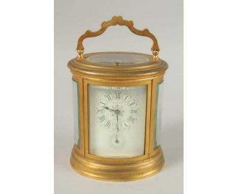 A VERY GOOD 19TH CENTURY OVAL CARRIAGE CLOCK. WILLIAM BOND &amp; Son, Boston, with alarm and repeat action. 14ins high includ