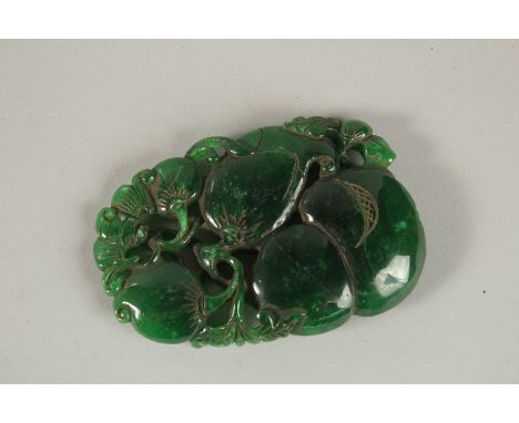 A LARGE PIERCED JADE PENDANT. 9cms x 6cms.