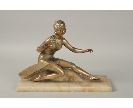 A GOOD ART DECO SEATED BRONZE NUDE on a marble base. 33cms high overall.