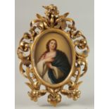 A GOOD CONTINENTAL PORCELAIN OVAL PLAQUE "The Blue Madonna". 17cm x 12.5cm in an engraved gilt