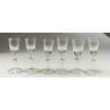 A SET OF SIX FUNNEL BOWL GLASSES on fold feet. 15cm high.