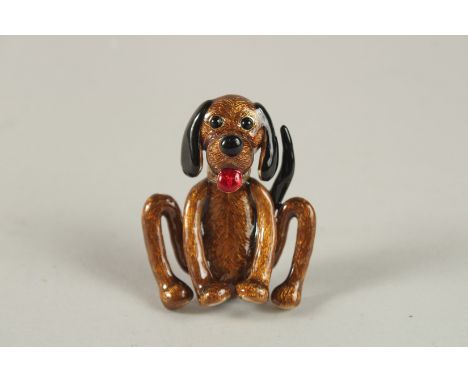 A BUTLER AND WILSON ENAMEL DOG BROOCH, boxed.