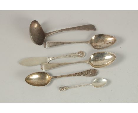 A GEORGE III SILVER LADLE. London 1809 and silver cutlery. Weight: 7ozs.