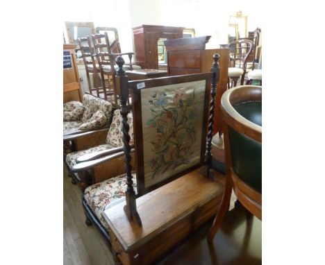 An oak framed tapestry firescreen