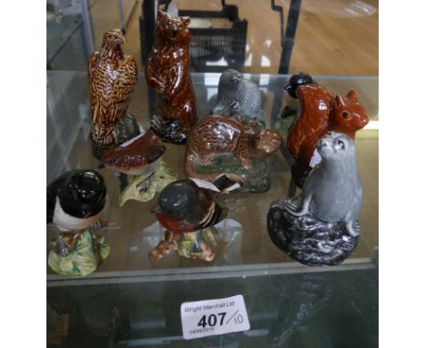 A mixed lot Beswick ornaments to include a range of miniature Beneagles Scotch whiskey decanters and various birds (10)