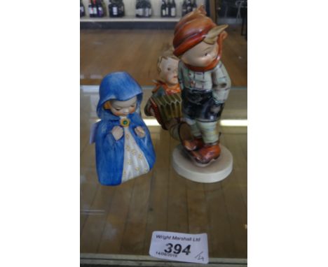 Four assorted small Goebel and similar figures of children