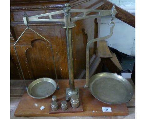 Vintage brass bean scales together with five accompanying weights