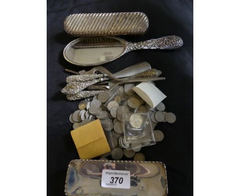 A selection of silver and white metal items. To include a silver trinket box, a silver handled mirror and brush, silver handl